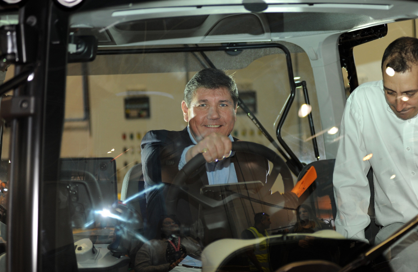 Stephen Metcalfe tries out CNH's new tractors.