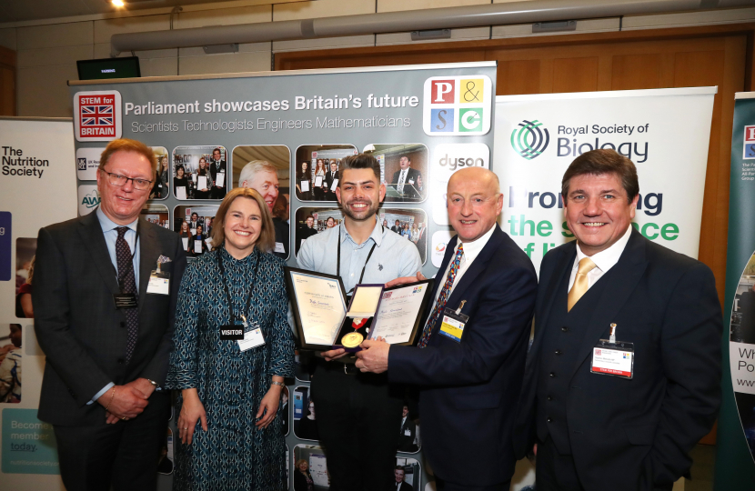 Stephen and the Parliamentary and Scientific Committee with Kyle Greenland for a photo.