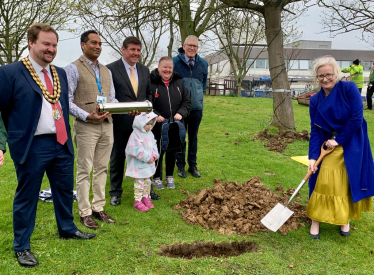 Stephen joins Rosie and Pamela Kirkman to bury the time capsule.