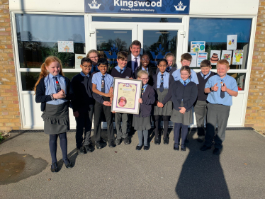 Stephen awards Kingswood pupils their Platinum Jubilee Certificate